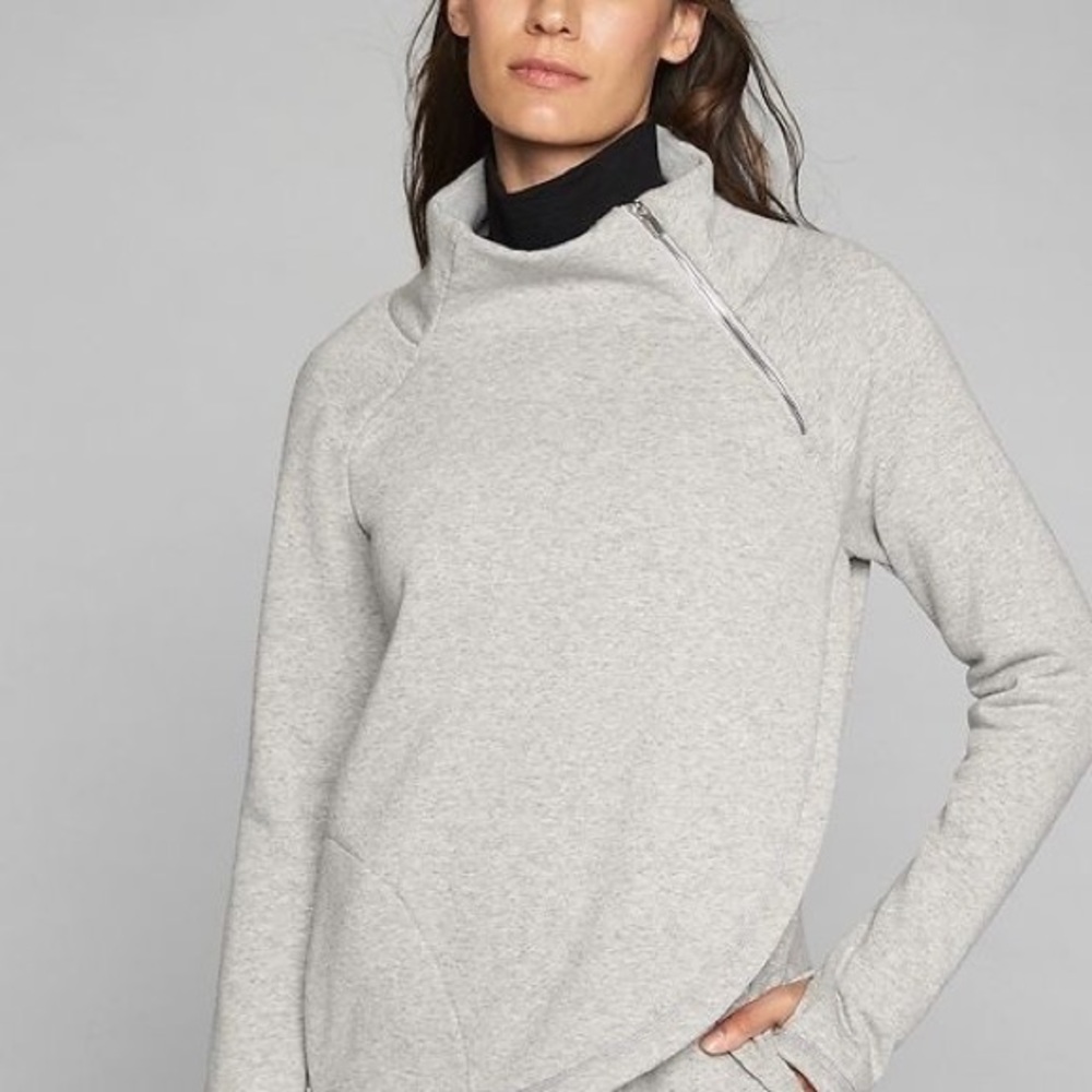 Athlete “karma” funnel neck sweater.